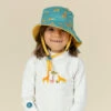 Chapeau Anti UV Bébé Réversible Jaune Et Bleu Imprimé SAVANE -Magasin De Matériel De Surf chapeau anti uv bebe reversible jaune et bleu imprime savane