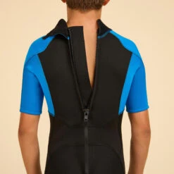 COMBINAISON SURF SHORTY 500 NEOPRENE 1.5MM GARCON BLEUE NOIRE -Magasin De Matériel De Surf combinaison surf shorty 500 neoprene 15mm garcon bleue noire 4